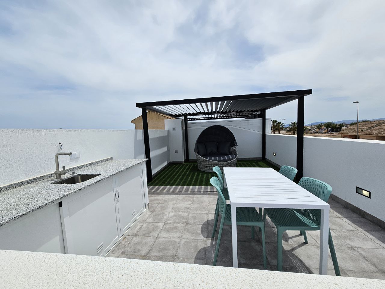 Dakterras van het vakantiehuis in Roldan, Spanje
