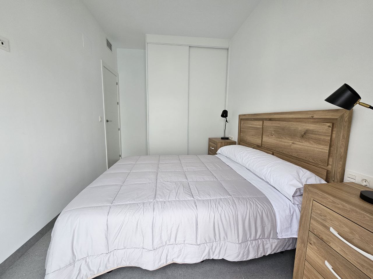 Slaapkamer 1 van het vakantiehuis in Roldan, Spanje